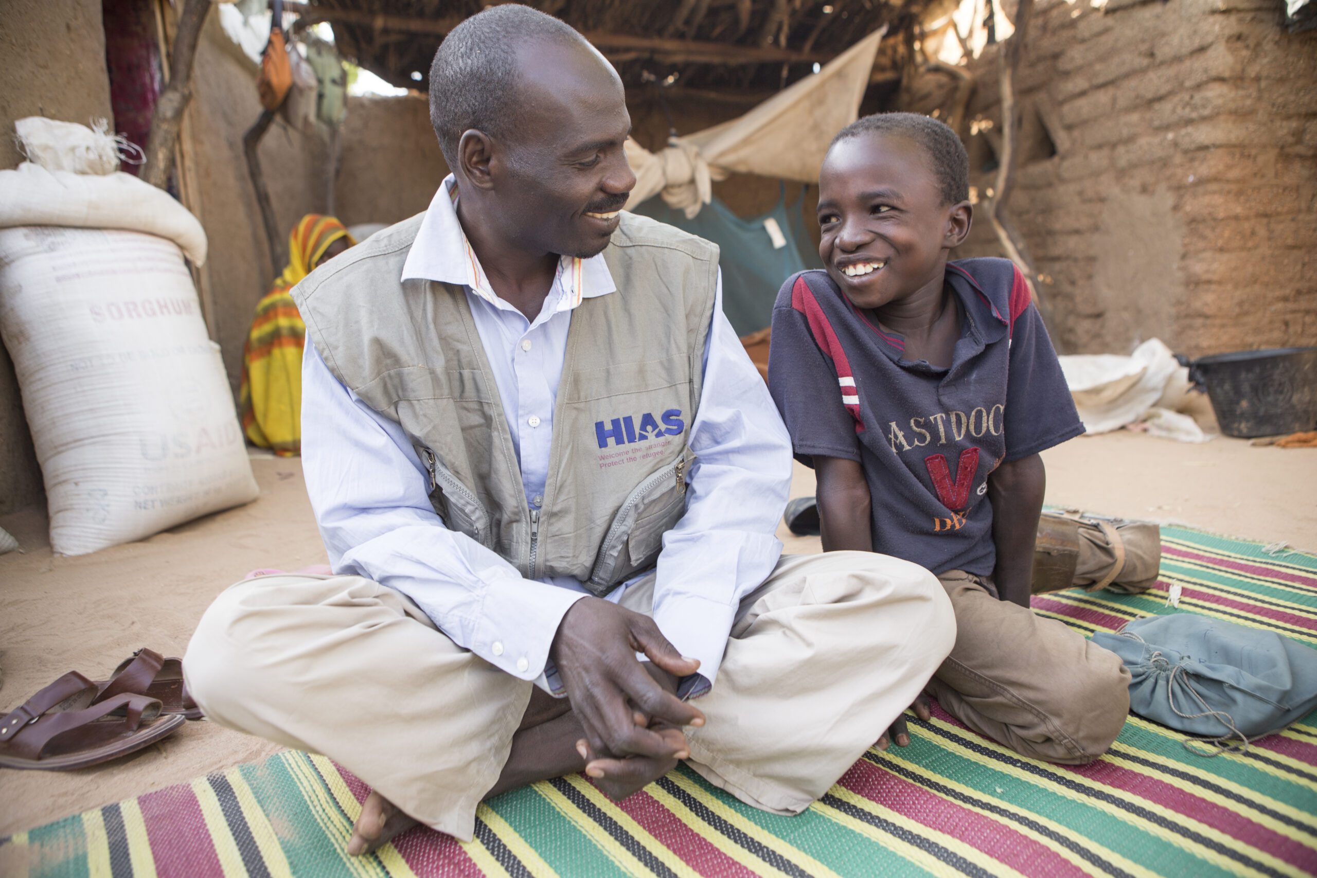 Chad/ Darfuri Refugees / Izadine Mohammed Mahamat, a 16 year old handicapped boy, is regularly visited by a HIAS community mobilizer who makes sure he and his family are doing okay at their home in Farchana, eastern Chad. / November 12, 2013 / Photo by Glenna Gordon